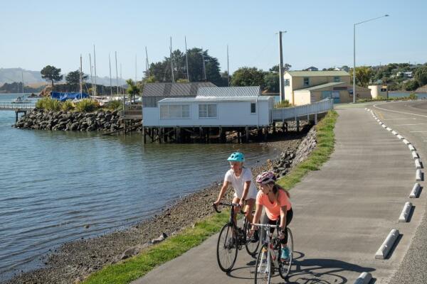 Image showing two people cycling around Broad Bay, Dunedin